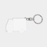 Línea extendida de artículos personalizados con atención al detalle, llavero flexómetro camión